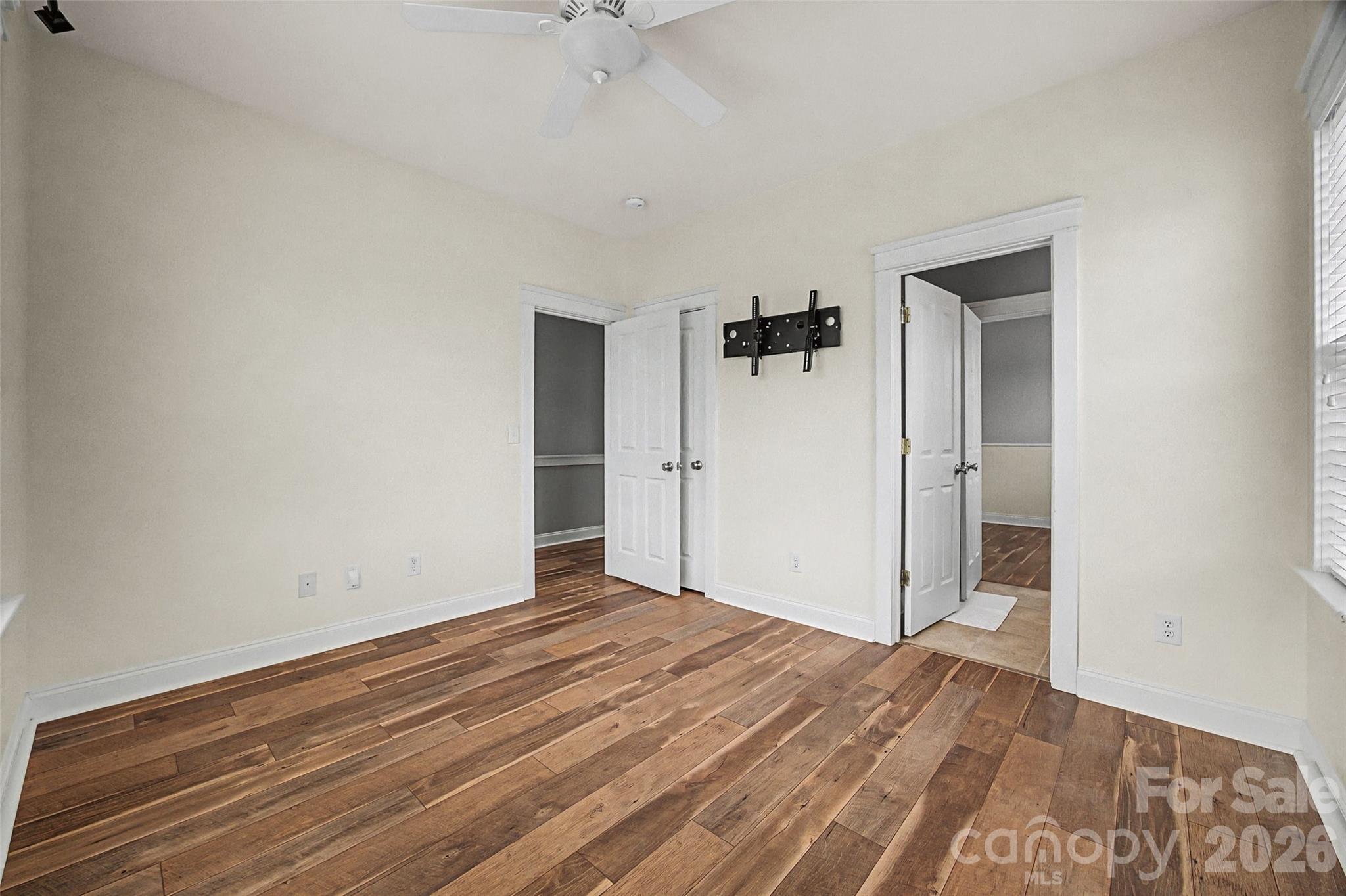 8123 Bud Henderson Road Huntersville, NC 28078 - Photo 31 of 48 a view of empty room with wooden floor