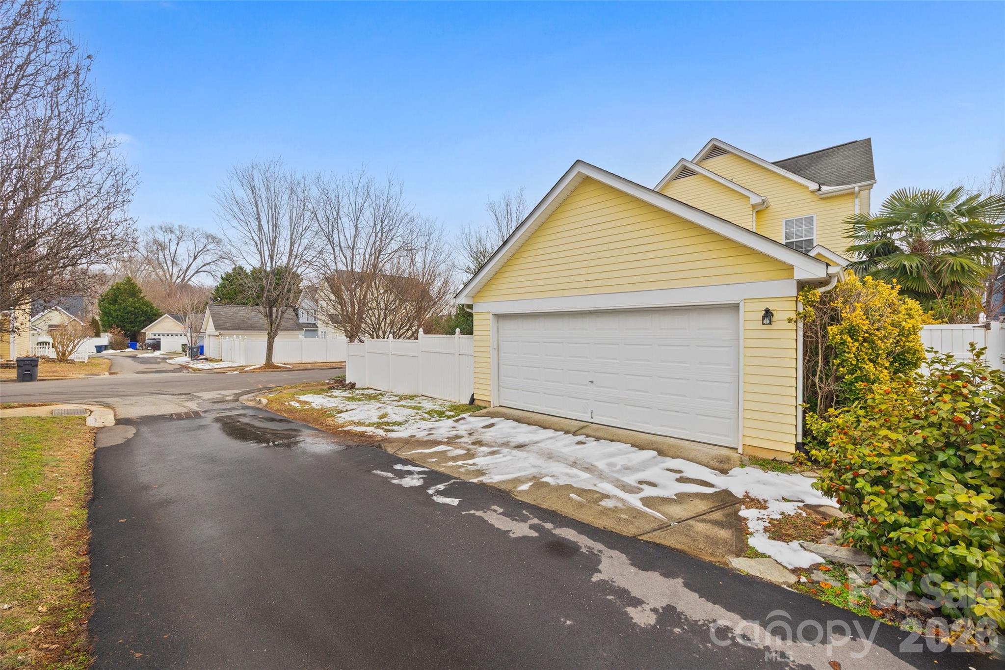 8123 Bud Henderson Road Huntersville, NC 28078 - Photo 44 of 48 a view of a house with a yard and garage