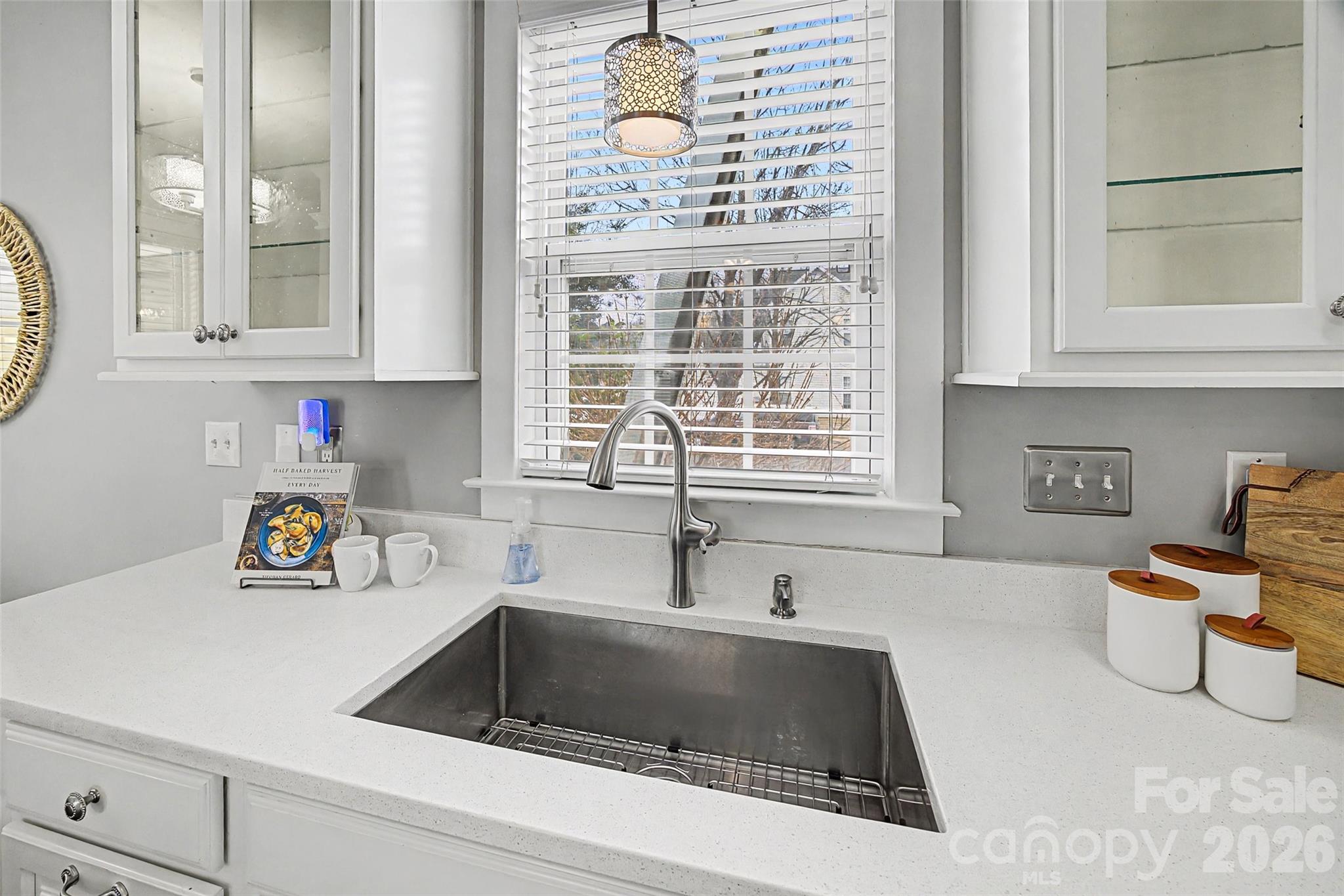 8123 Bud Henderson Road Huntersville, NC 28078 - Photo 10 of 48 a kitchen with a sink and a window