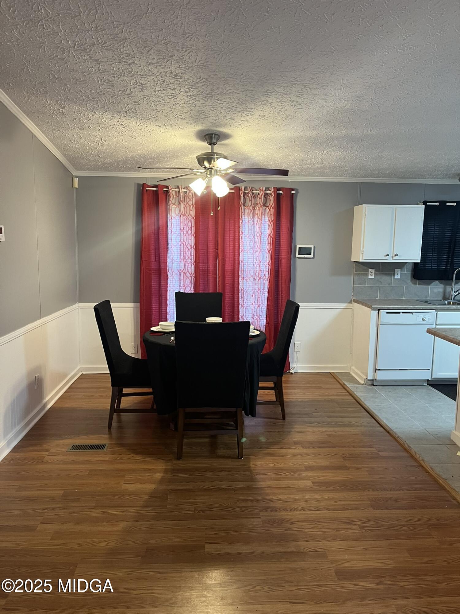 111 Mandy Court Macon, GA 31217 - Photo 7 of 12 a view of a dining room with furniture and chandelier