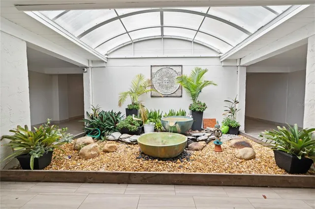 a vase of flowers sitting on a table