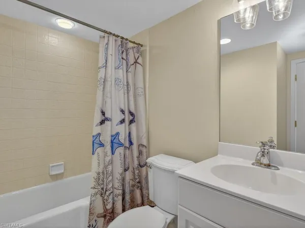 $895,000 | 6001 Pelican Bay Boulevard, Unit 503, Naples, FL 34108