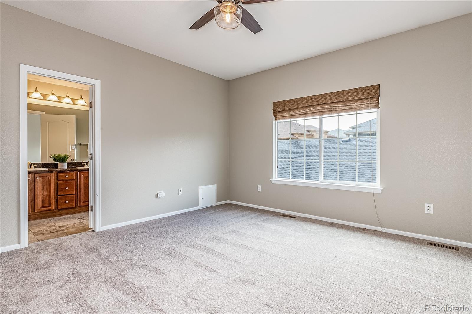 592 Brookhurst Avenue, Unit 26B Highlands Ranch, CO 80129 - Photo 14 of 19 a view of an empty room with a window
