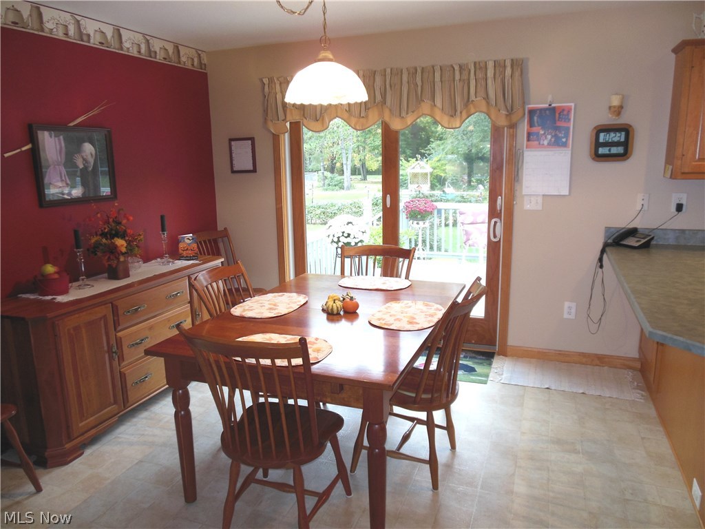 2499 Haines Road Madison, OH 44057 - Photo 8 of 29 Dining Area leads to Deck