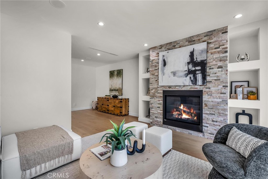5110 Greenbush Avenue Sherman Oaks, CA 91423 - Photo 18 of 40 a living room with furniture and a fireplace