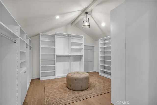 a bathroom with a granite countertop sink mirror and bathtub