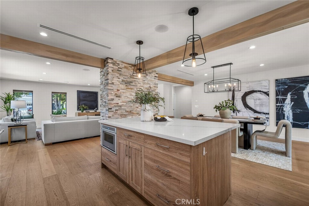 5110 Greenbush Avenue Sherman Oaks, CA 91423 - Photo 9 of 40 a kitchen with a stove a refrigerator and windows