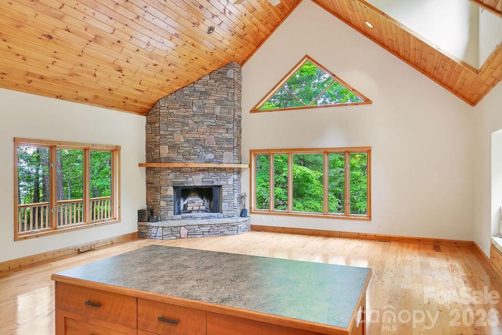 40 Walnut Ridge Road Brevard, NC 28712 - Photo 13 of 47 a view of an empty room with a fireplace and a window