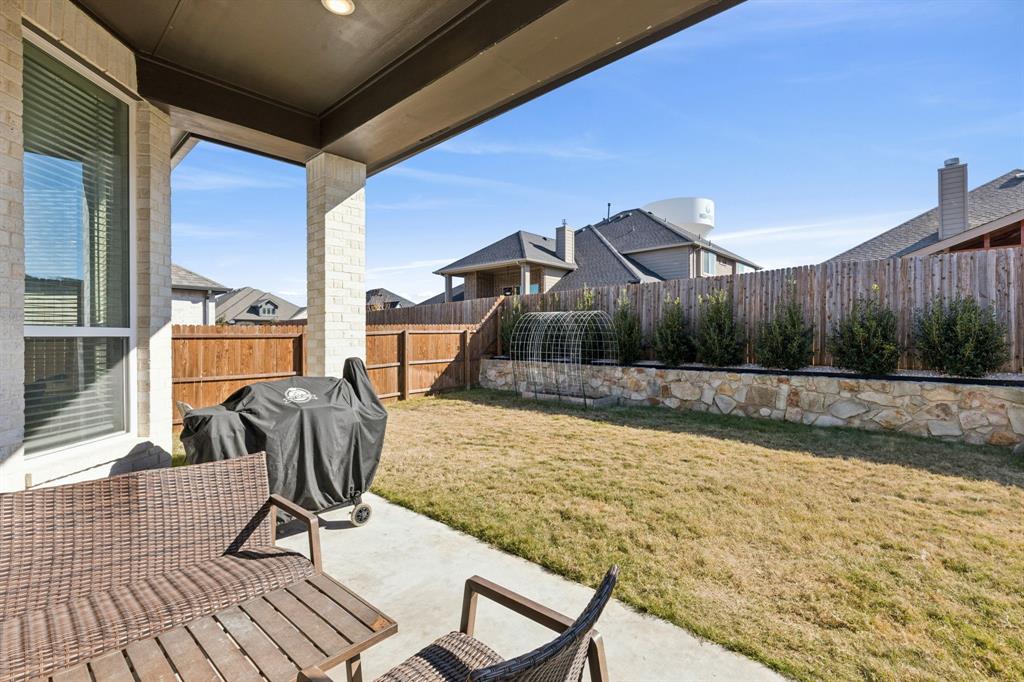 1903 Midhurst Drive Forney, TX 75126 - Photo 23 of 31 a view of a chairs and table in patio