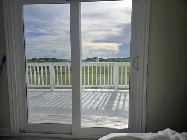 a view of a glass door with a door