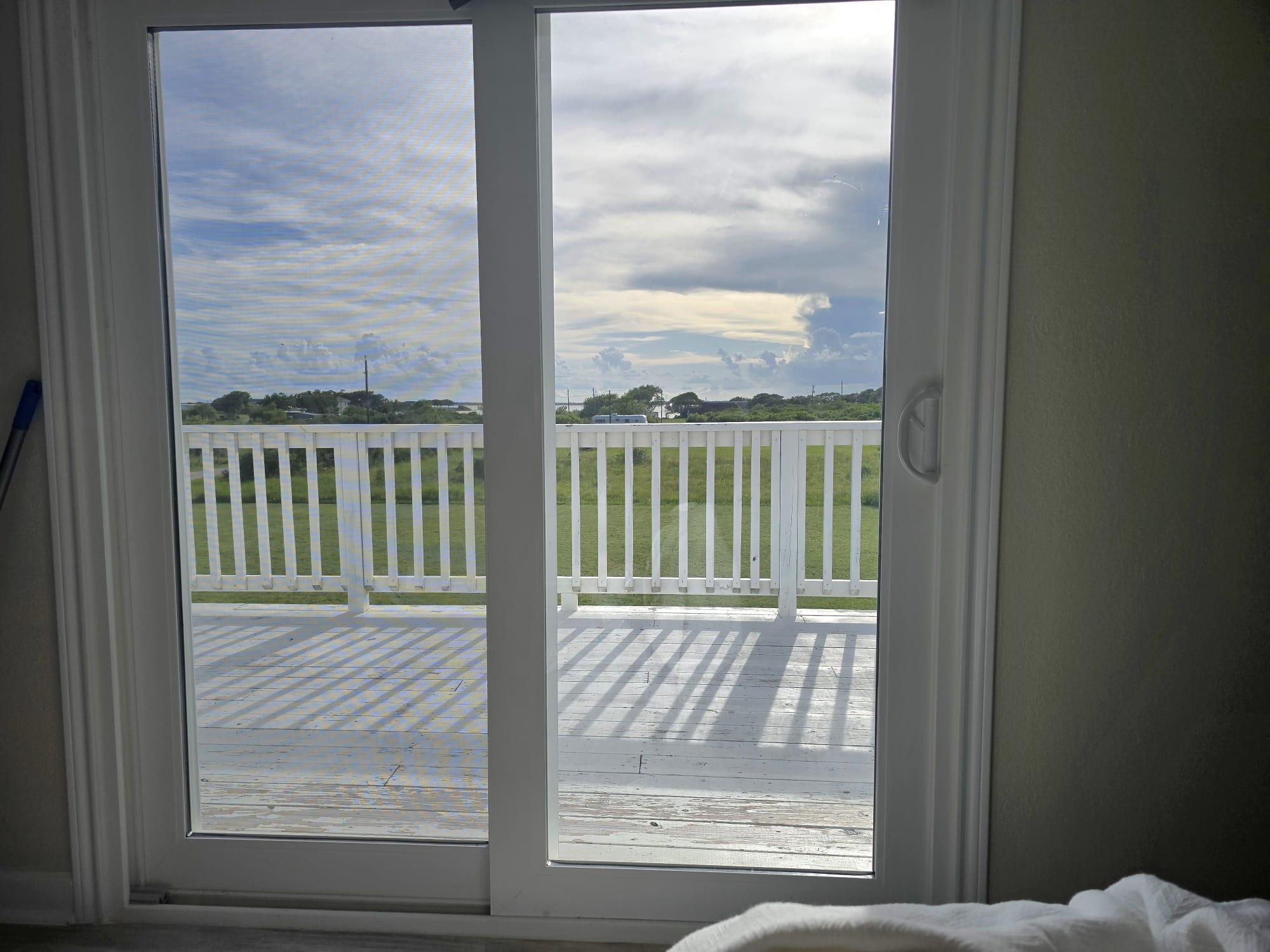 3582 County Road 476 Palacios, TX 77465 - Photo 14 of 31 a view of a glass door with a door
