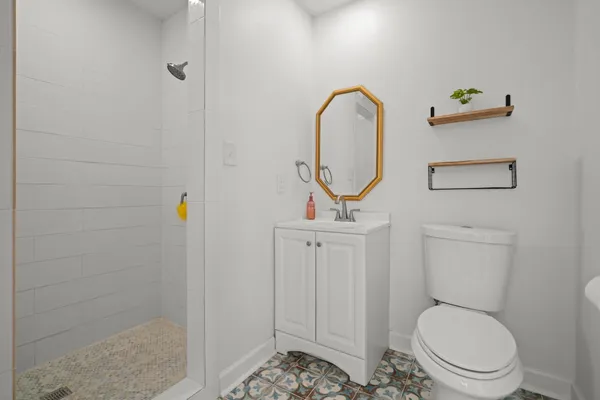 a bathroom with a toilet and a sink