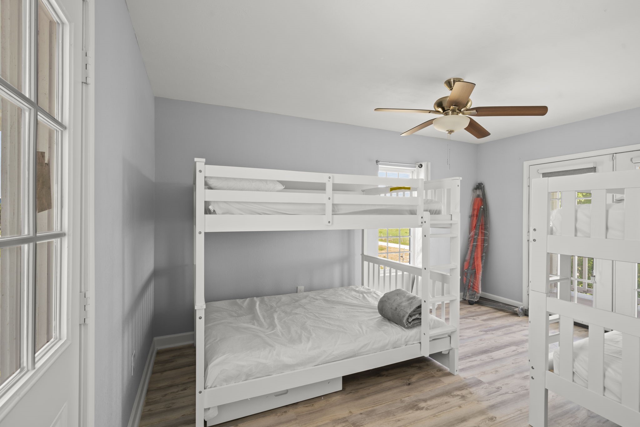 3582 County Road 476 Palacios, TX 77465 - Photo 18 of 31 a bedroom with a bed and a chandelier