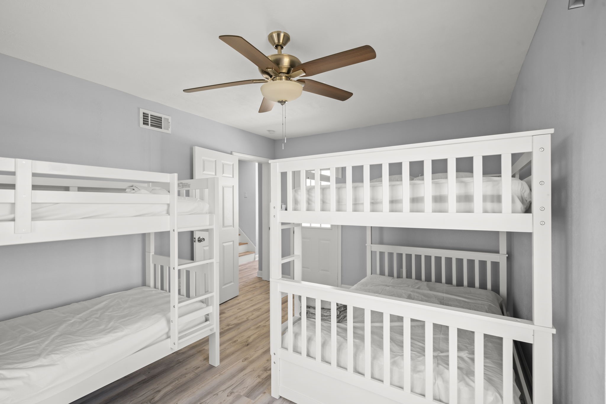 3582 County Road 476 Palacios, TX 77465 - Photo 19 of 31 a view of a bedroom with wooden floor