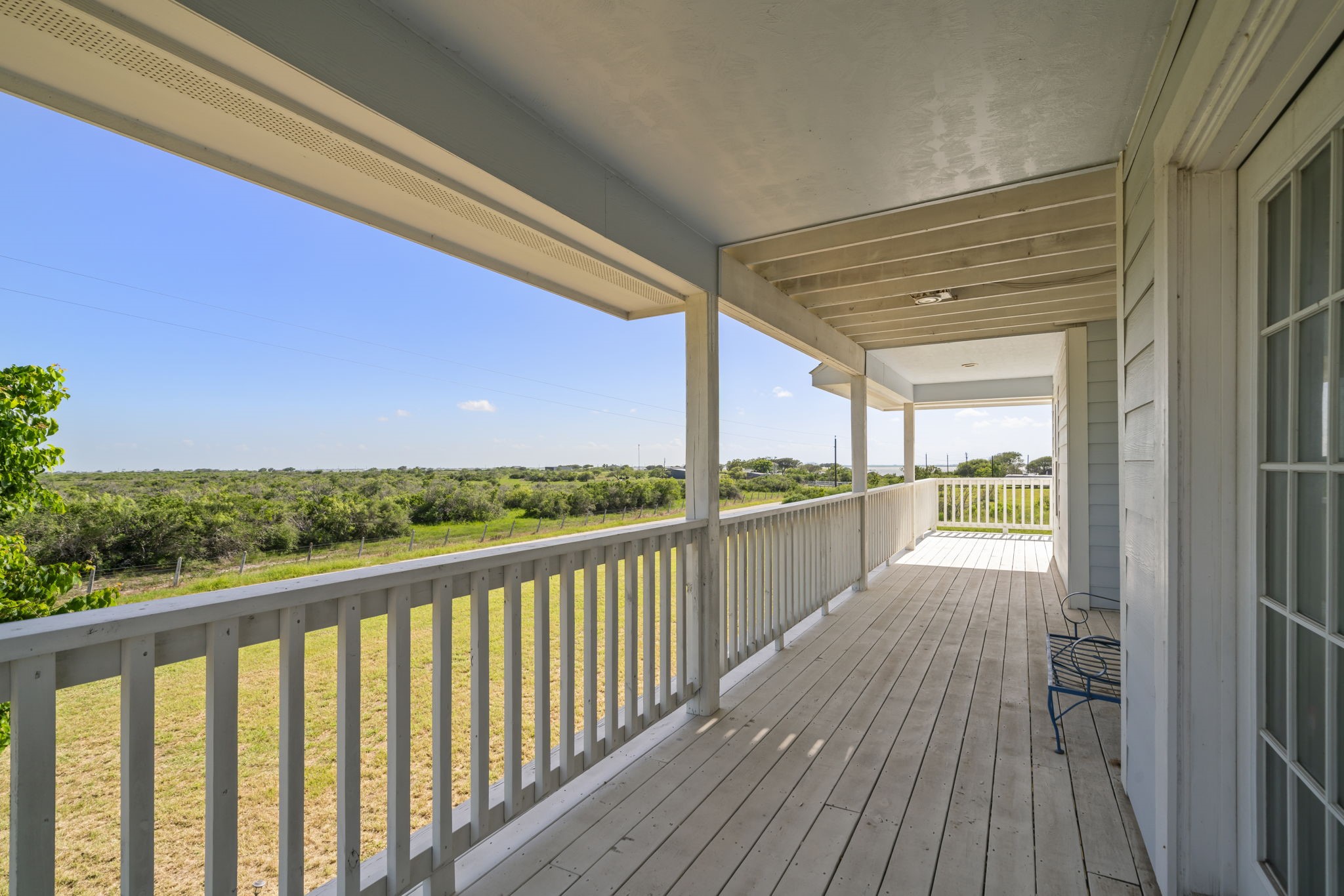 3582 County Road 476 Palacios, TX 77465 - Photo 23 of 31 a view of a balcony with wooden floor