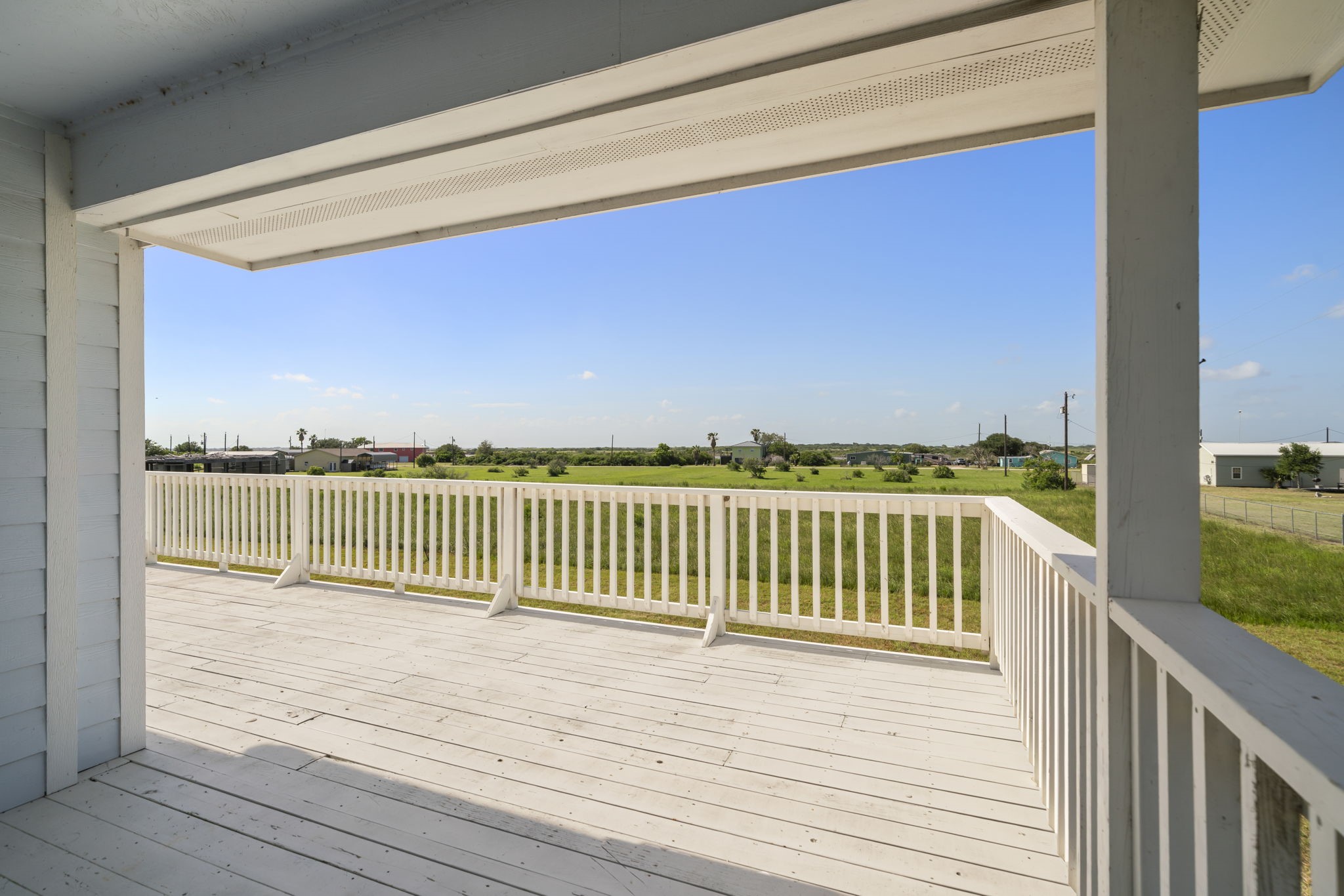 3582 County Road 476 Palacios, TX 77465 - Photo 25 of 31 a view of a balcony with wooden floor
