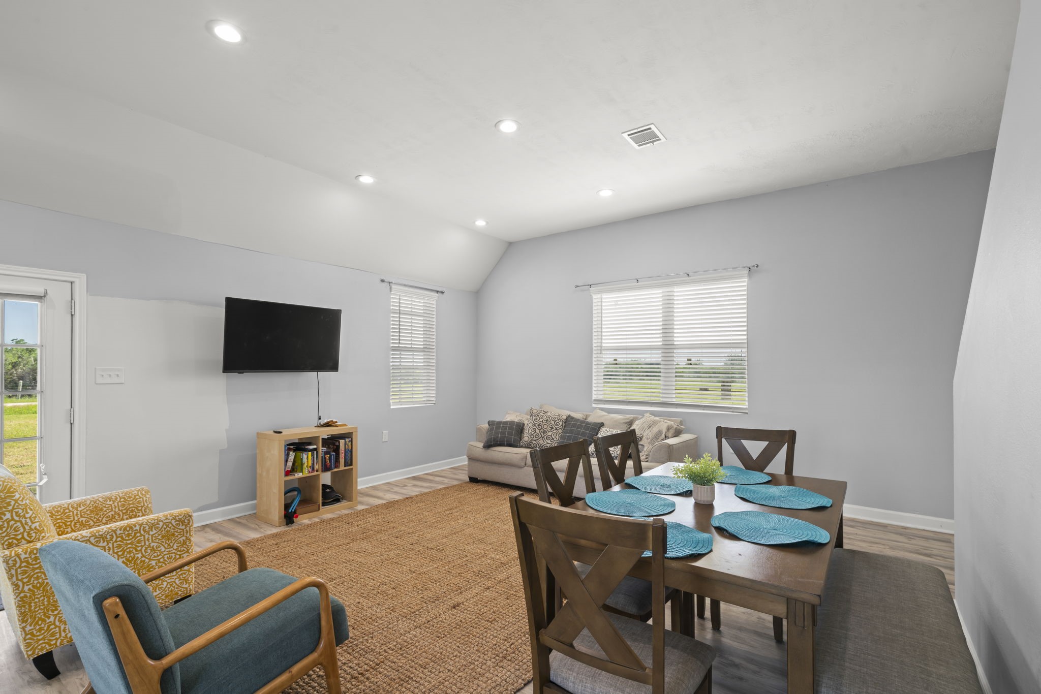 3582 County Road 476 Palacios, TX 77465 - Photo 3 of 31 a living room with furniture and a flat screen tv