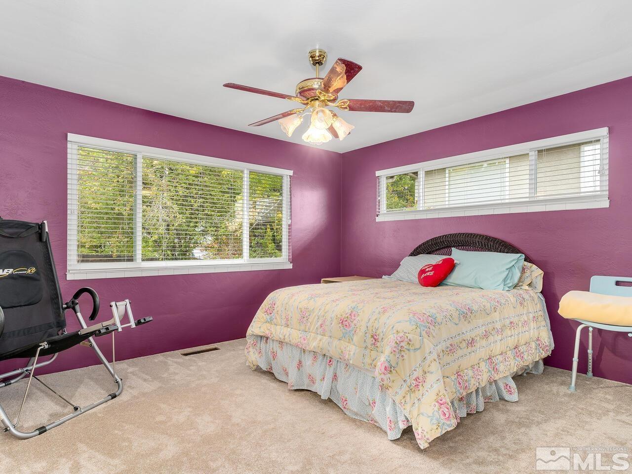 2125 Lakeside Drive Reno, NV 89509 - Photo 20 of 33 a bedroom with a bed and a window