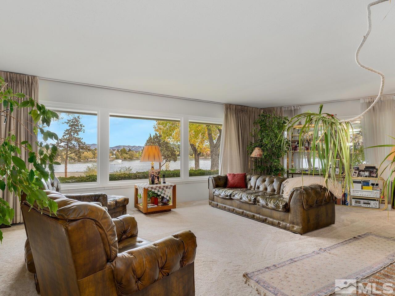 2125 Lakeside Drive Reno, NV 89509 - Photo 2 of 33 a living room with furniture and a large window