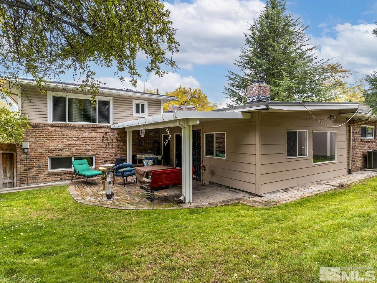 2125 Lakeside Drive Reno, NV 89509 - Photo 30 of 33 a view of a house with a backyard