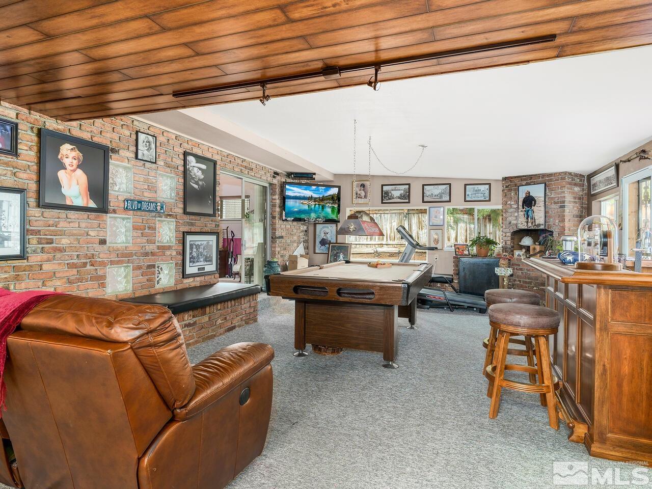 2125 Lakeside Drive Reno, NV 89509 - Photo 9 of 33 a living room with furniture and a wooden floor