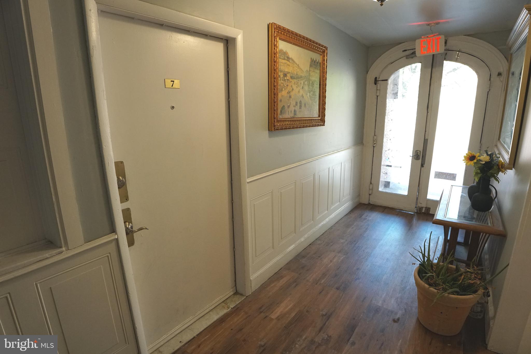 804 Cathedral Street, Unit 7 Baltimore, MD 21201 - Photo 17 of 22 a view of entryway with wooden floor