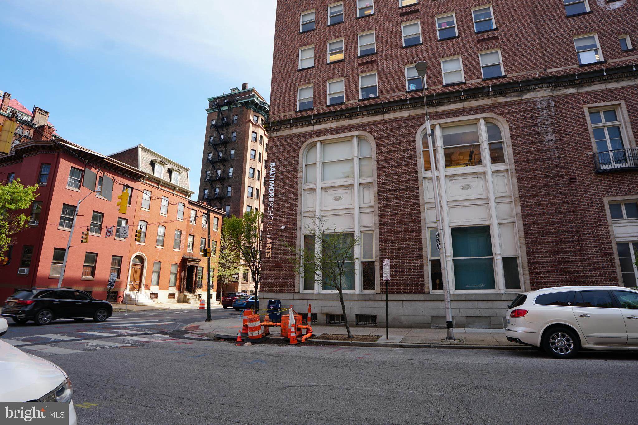 804 Cathedral Street, Unit 7 Baltimore, MD 21201 - Photo 22 of 22 a car parked in front of a building