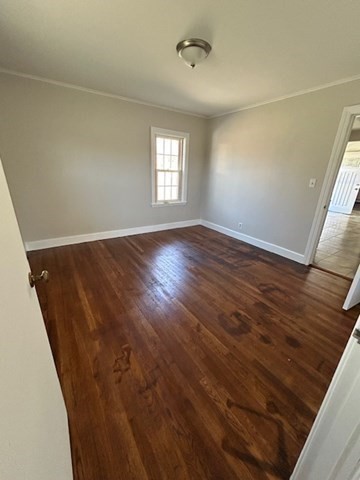 171 Mendon Road Attleboro, MA 02703 - Photo 5 of 11 a view of an empty room with wooden floor and a window