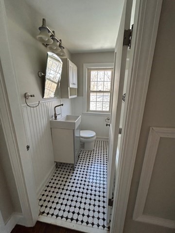 171 Mendon Road Attleboro, MA 02703 - Photo 8 of 11 a bathroom with a sink toilet and window