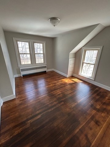 171 Mendon Road Attleboro, MA 02703 - Photo 9 of 11 an empty room with wooden floor and windows