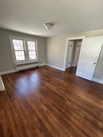 171 Mendon Road Attleboro, MA 02703 - Photo 10 of 11 an empty room with wooden floor and windows