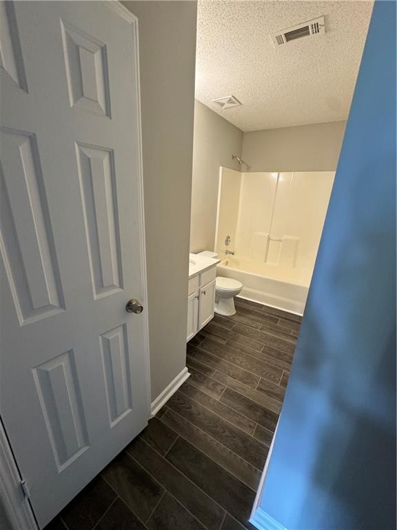 5309 Cattail Lane Atlanta, GA 30349 - Photo 4 of 9 a view of a room with wooden floor and staircase