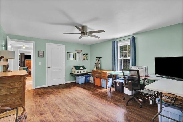 a workspace with furniture hardwood and a workspace