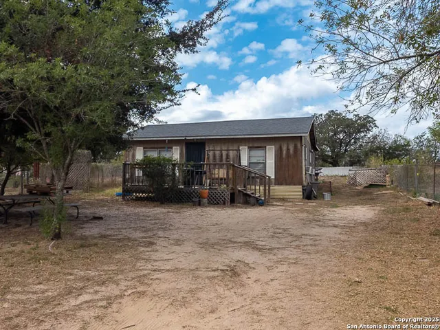 a view of a house with a patio