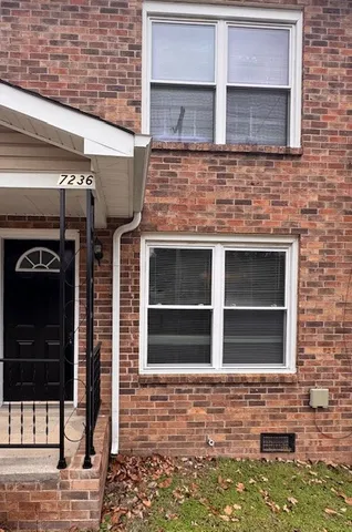 a front view of a house with a window