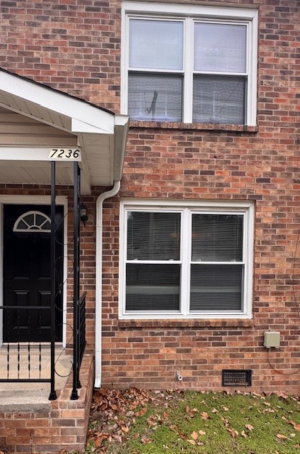 a front view of a house with a window