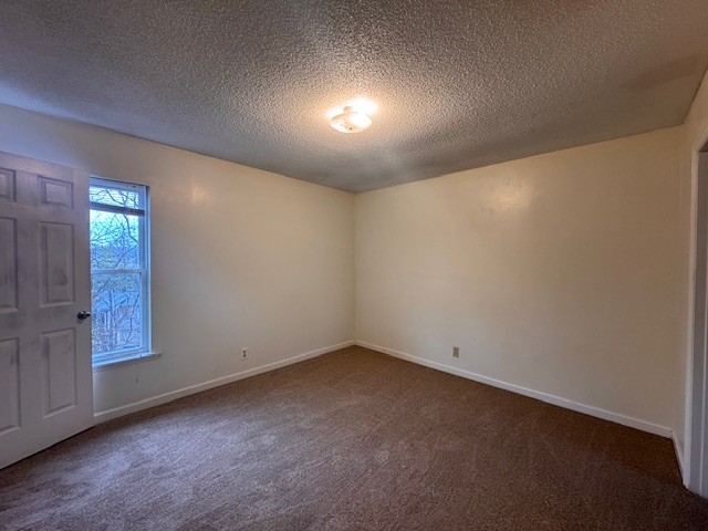 7236 Old Harding Pike Nashville, TN 37221 - Photo 4 of 5 an empty room with wooden floor and windows