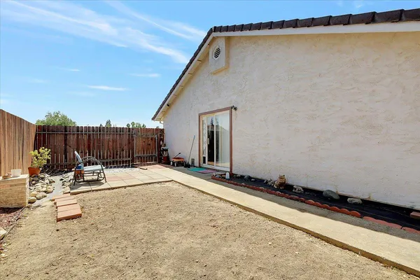 a view of a terrace with a tree