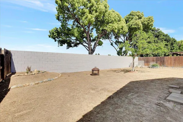 a view of a brick house with wooden floor