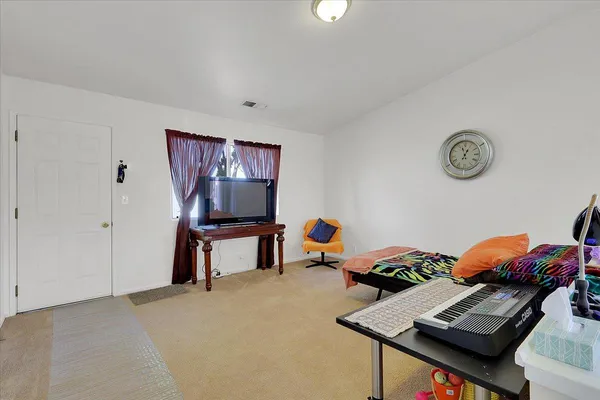 a room with furniture and a window
