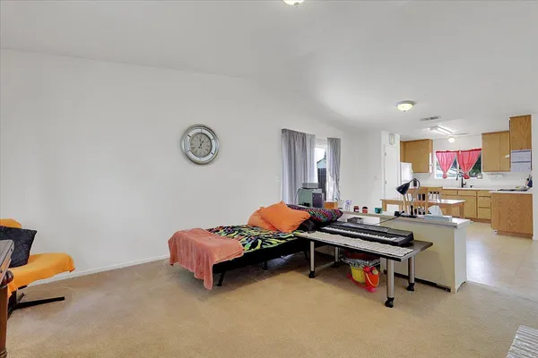 a living room with furniture and a table