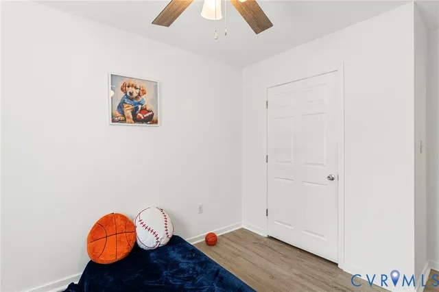a view of entryway with wooden floor