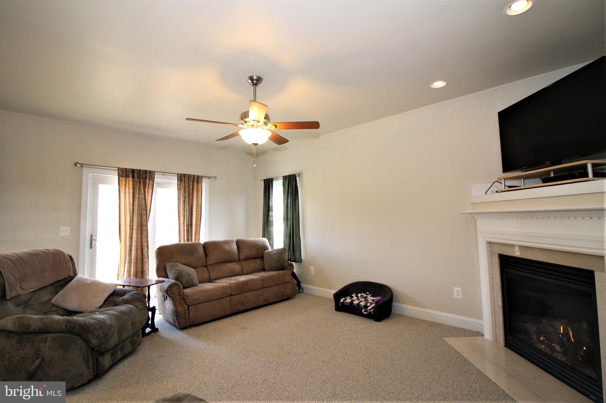 13544 Union Church Road Sumerduck, VA 22742 - Photo 11 of 36 Family room opens to deck