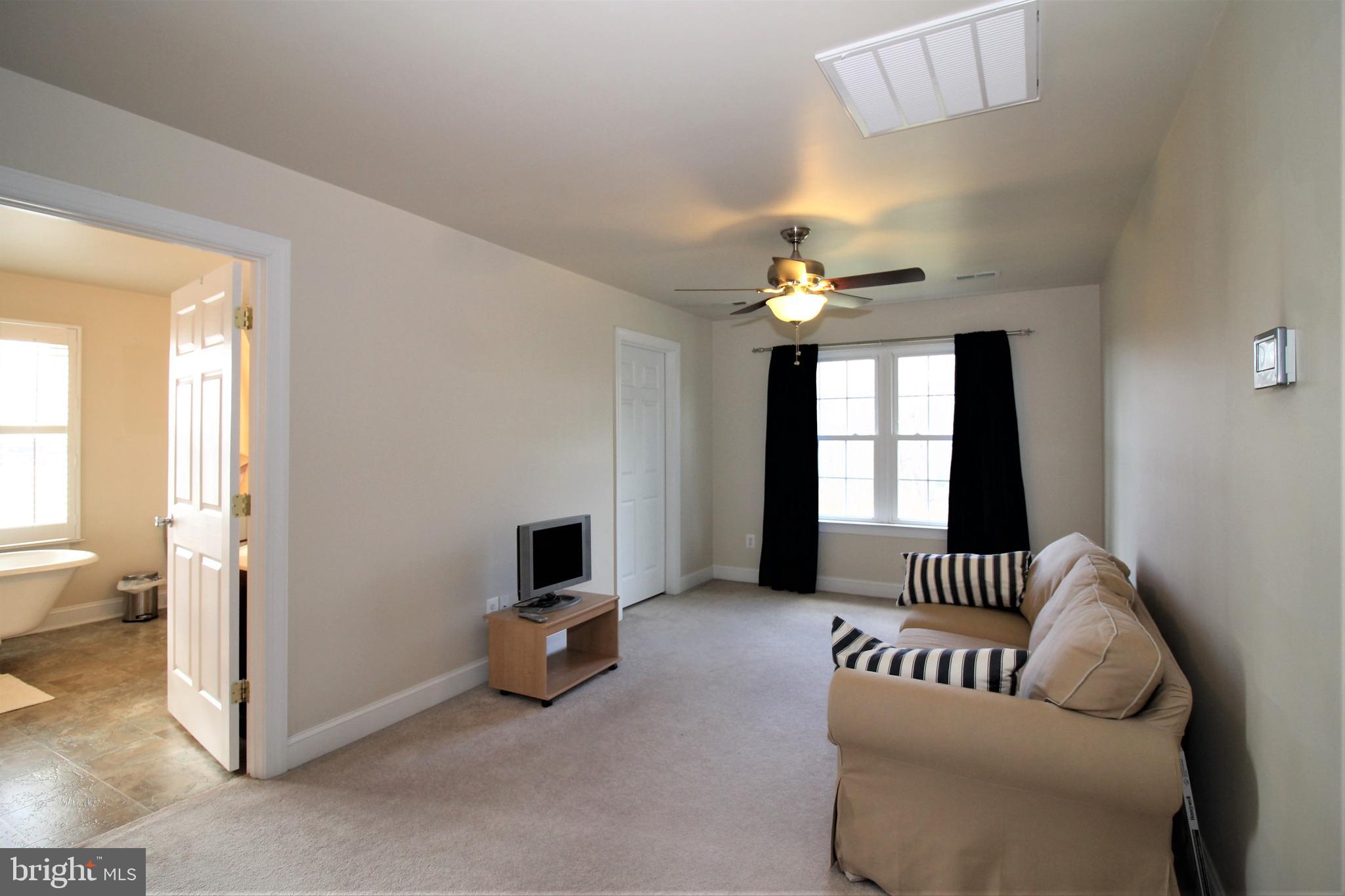 13544 Union Church Road Sumerduck, VA 22742 - Photo 22 of 36 Primary Bedroom Sitting Area with fan