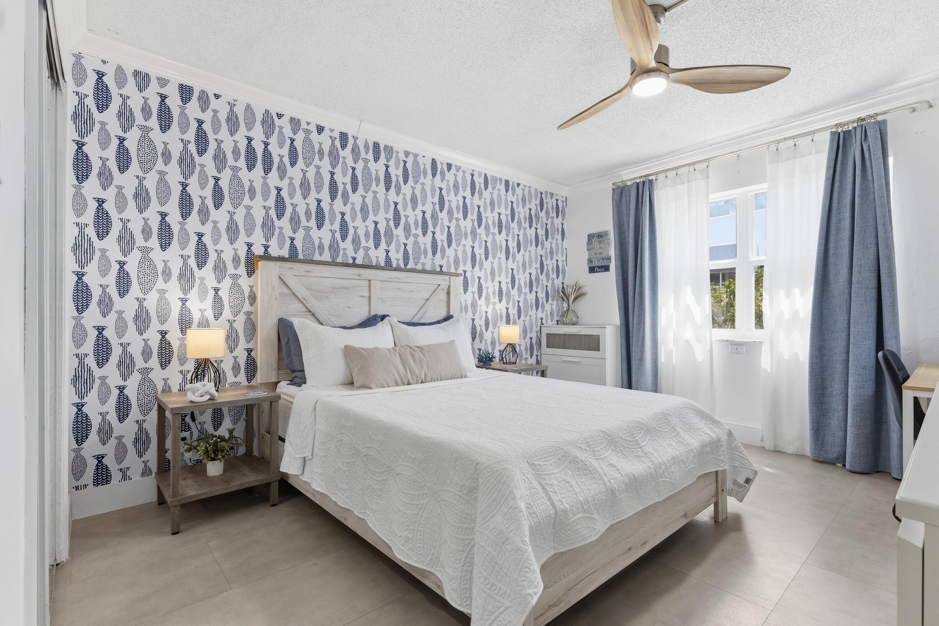 a bedroom with a bed bed and a window