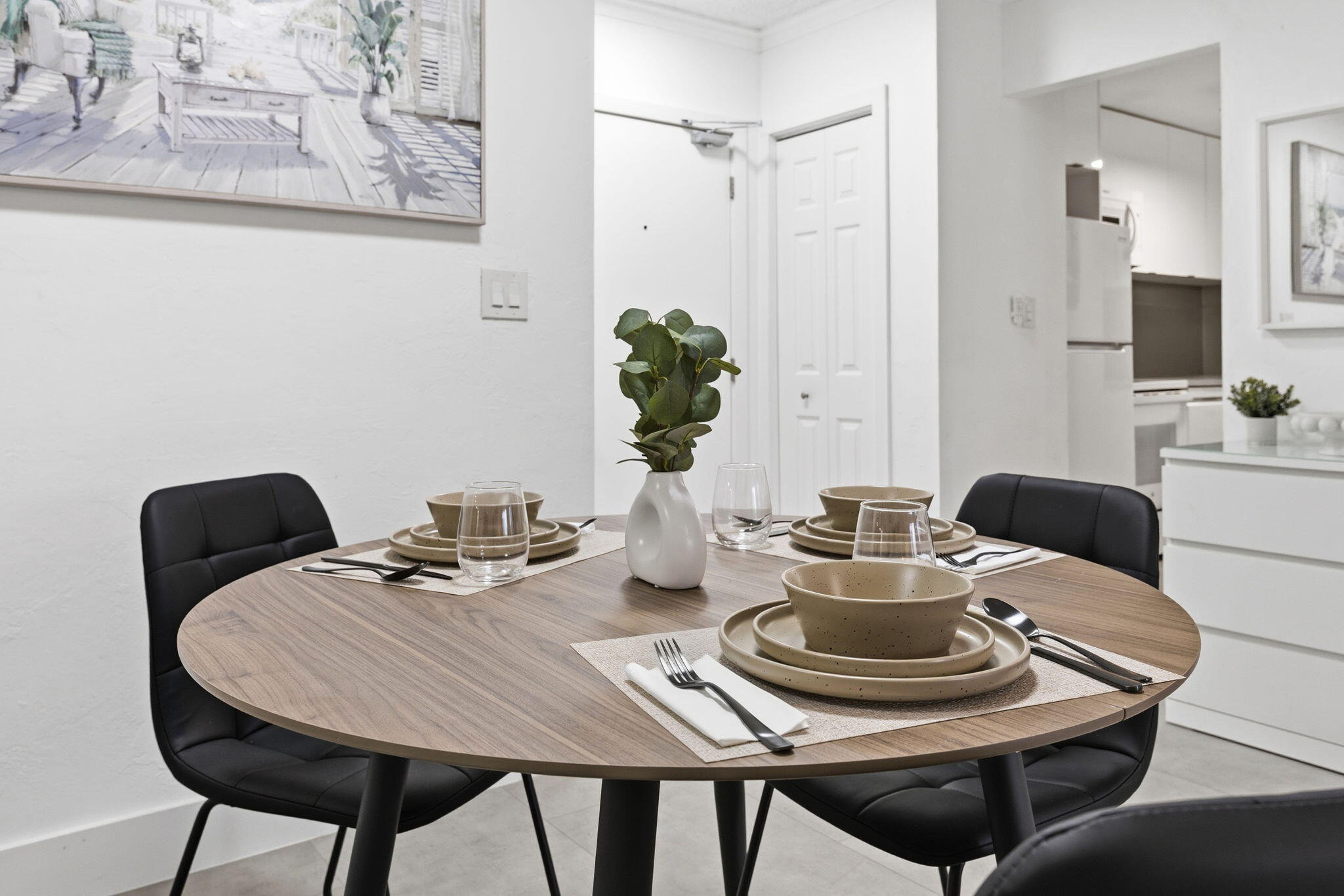 3000 Riomar Street, Unit 407 Fort Lauderdale, FL 33304 - Photo 11 of 38 a view of a dining room with furniture and wooden floor