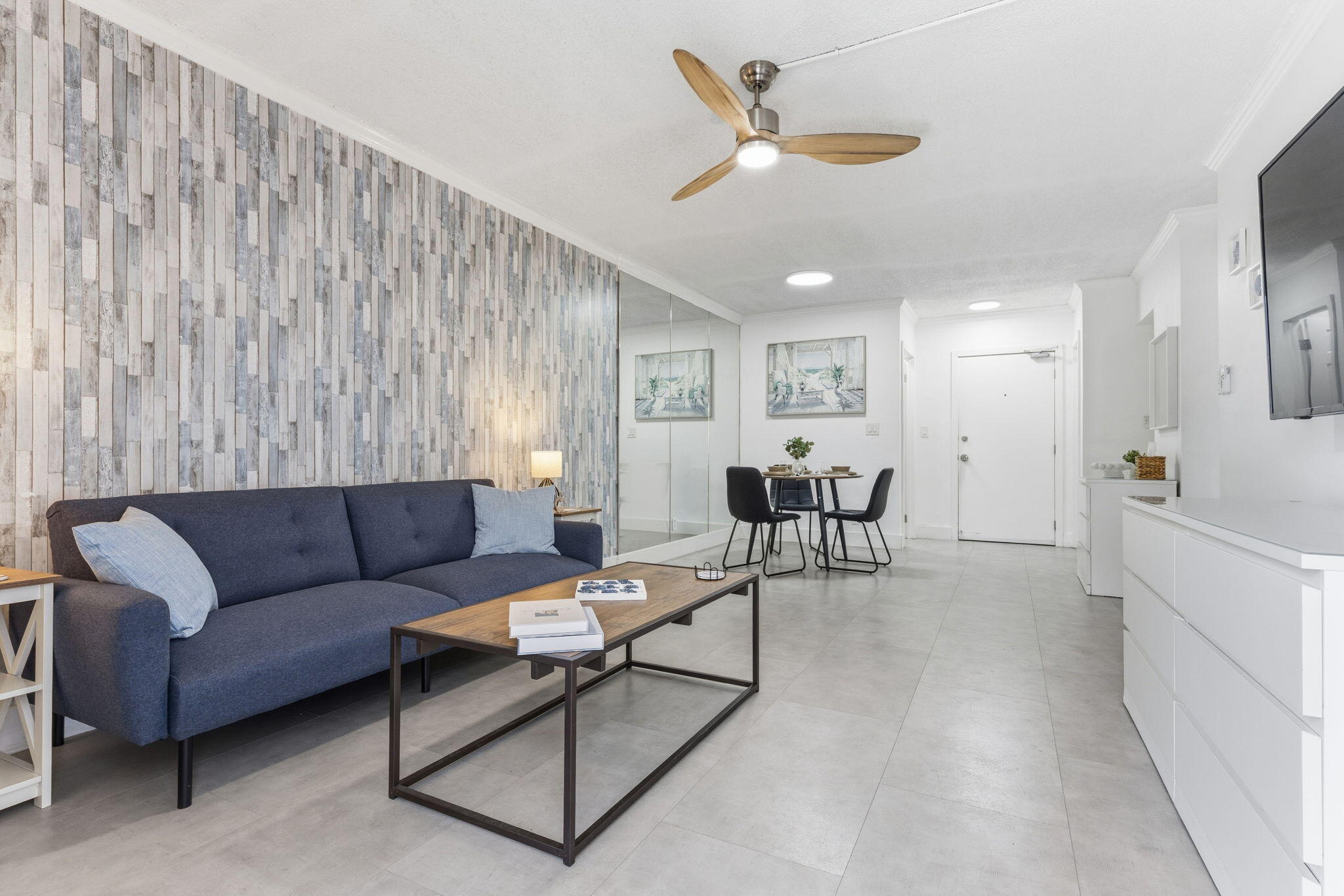 3000 Riomar Street, Unit 407 Fort Lauderdale, FL 33304 - Photo 12 of 38 a living room with furniture and a view of kitchen