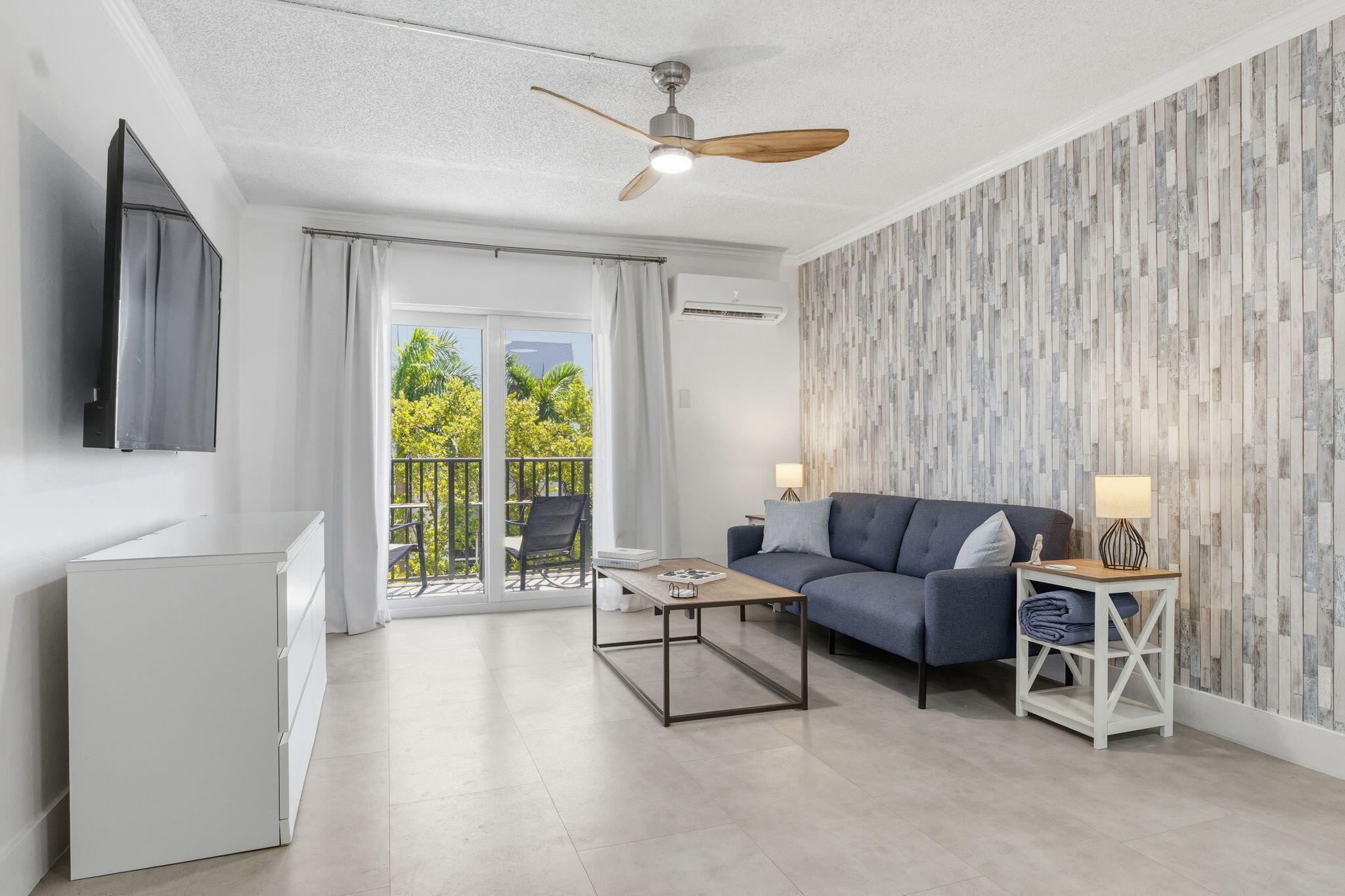 3000 Riomar Street, Unit 407 Fort Lauderdale, FL 33304 - Photo 13 of 38 a living room with furniture and a window