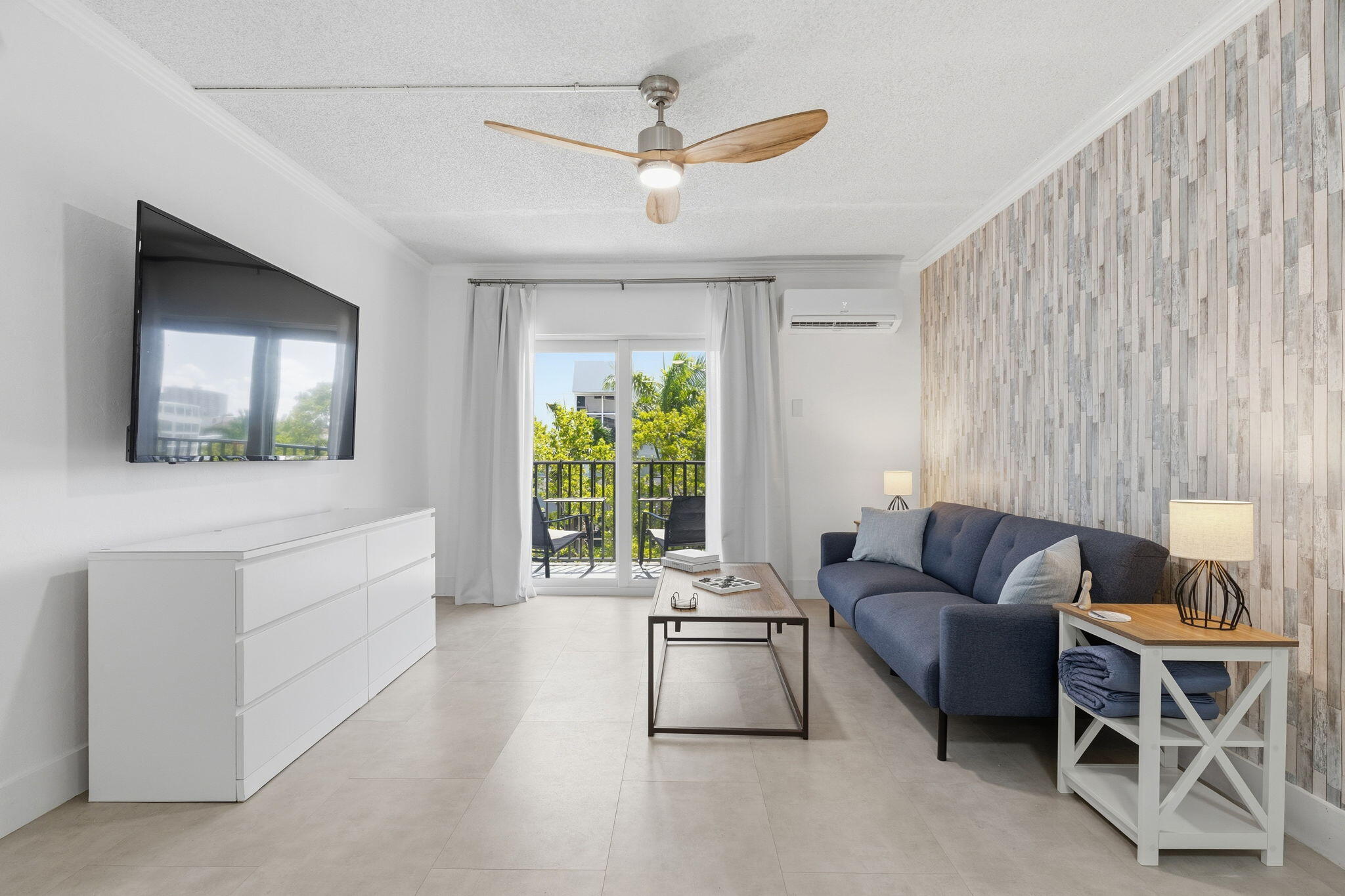 3000 Riomar Street, Unit 407 Fort Lauderdale, FL 33304 - Photo 15 of 38 a living room with furniture and a large window