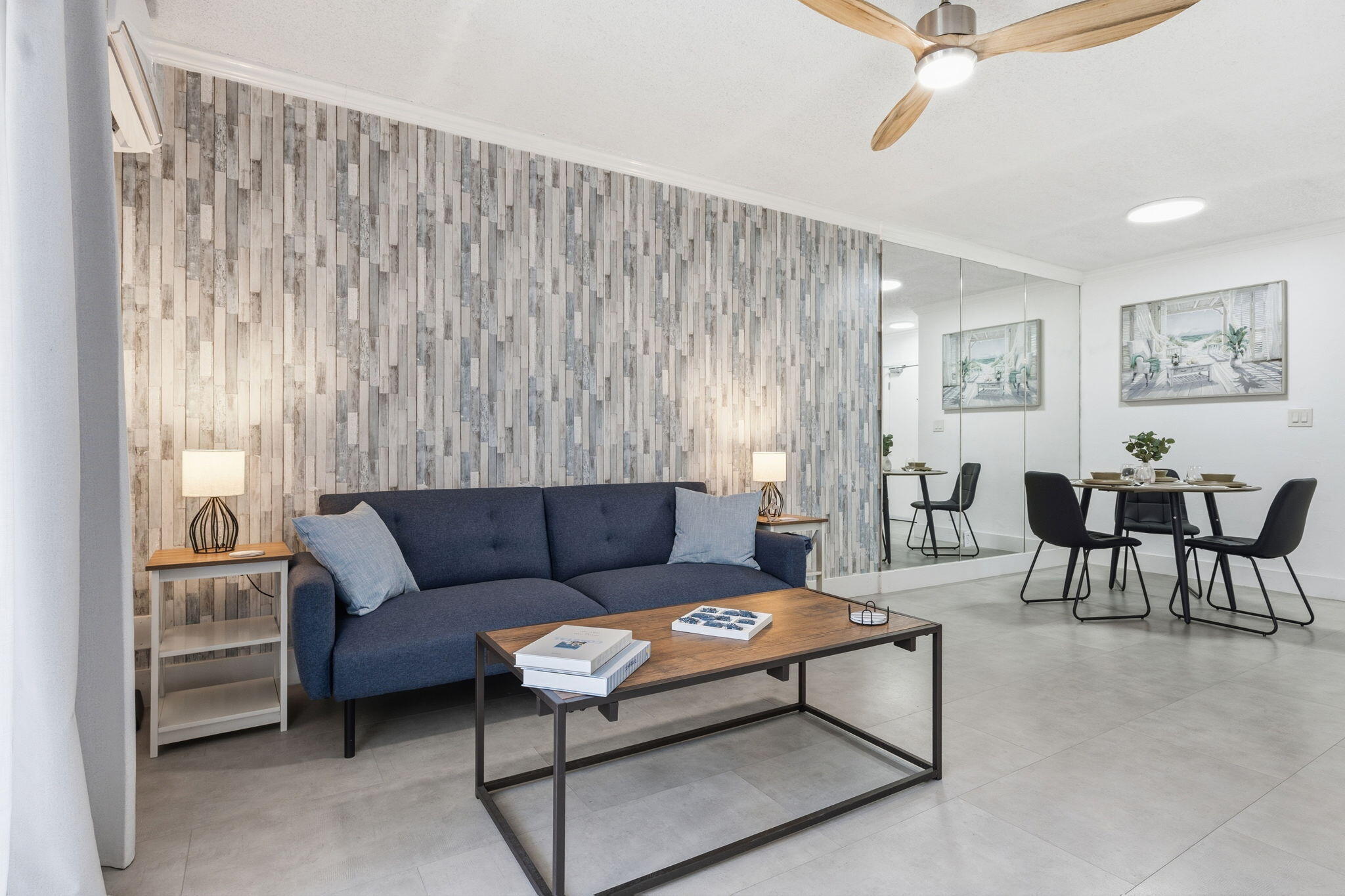 3000 Riomar Street, Unit 407 Fort Lauderdale, FL 33304 - Photo 2 of 38 a living room with furniture and a large window